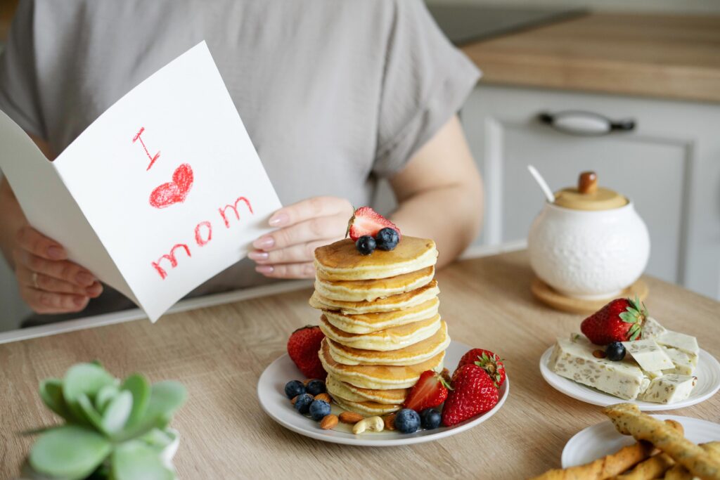 Breakfast-surprise-pancakes-with-strawberries-and-blueberries-scaled